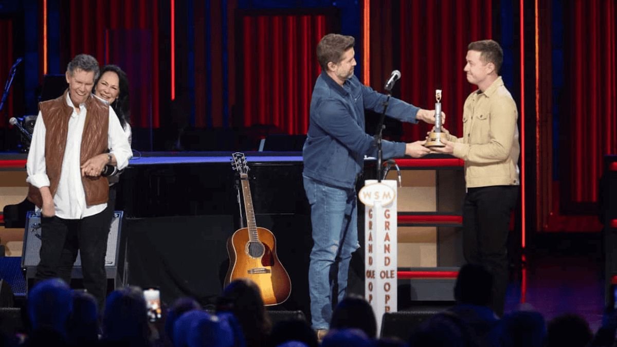 Grand Ole Opry Stuns Fans With Emotional Tribute Display to Randy Travis, Scotty McCreery & Josh Turner — “Who Will Fill Their Shoes?”
